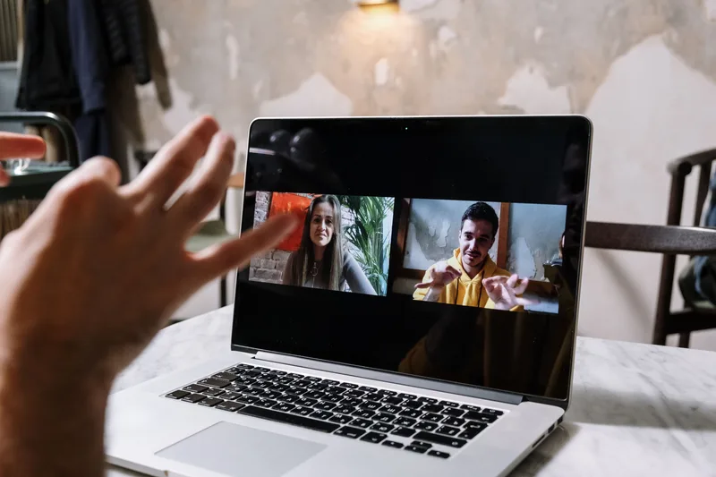 Team collaborating virtually during a remote onboarding call