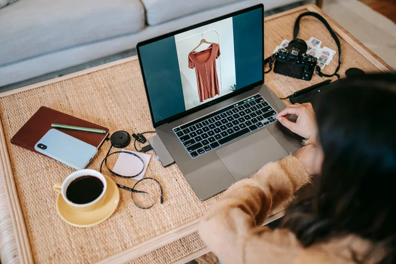 Virtual assistant working on ecommerce tasks on a laptop