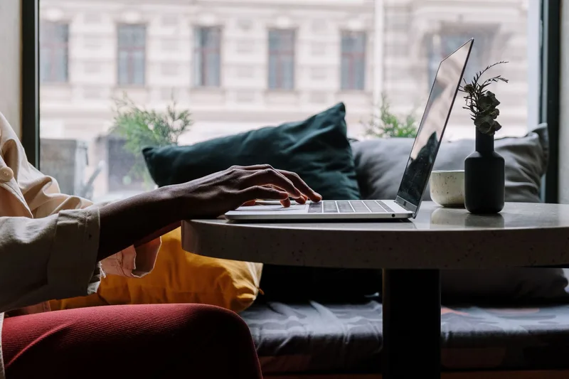 Woman packing products for her online store, managing ecommerce operations from home